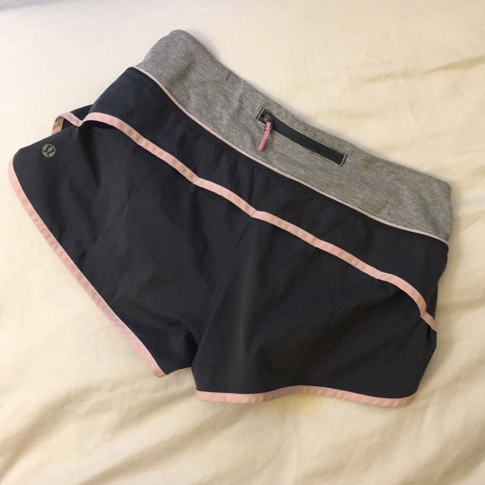 Lululemon running shorts (w/ shopping bag)